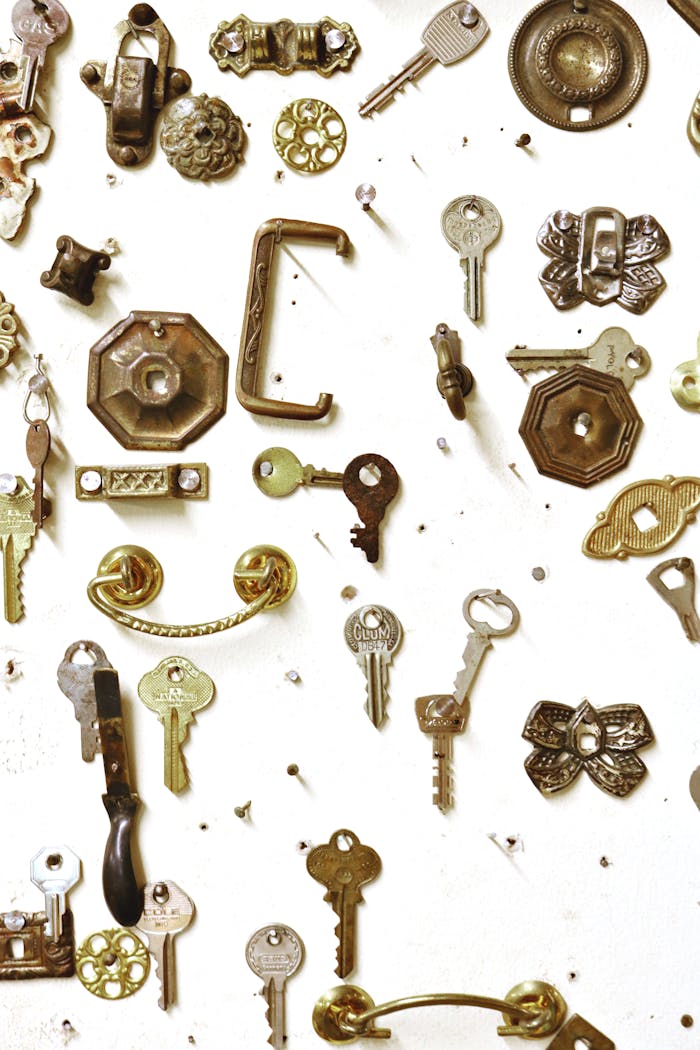 our-services-2 Assorted vintage keys and hardware showcased on a white background, highlighting intricate designs.